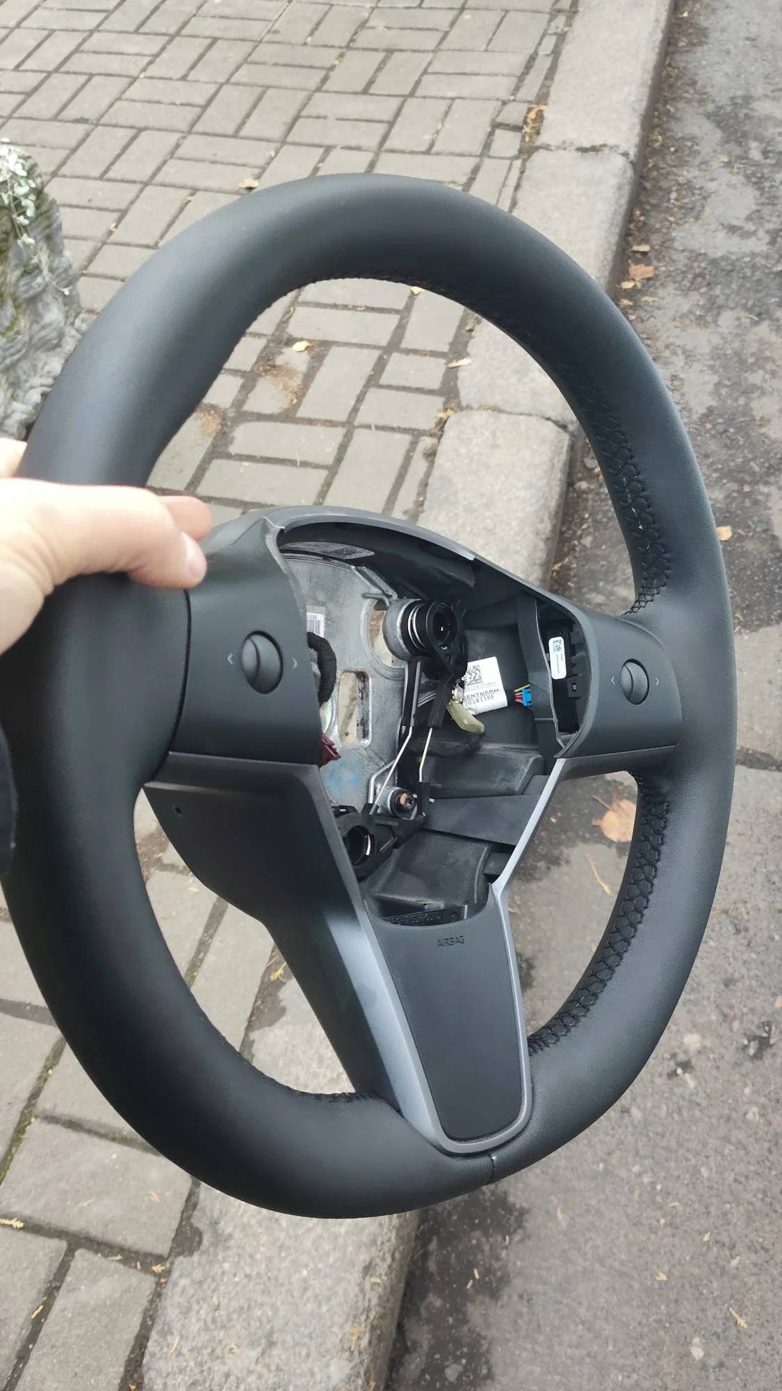 перетяжка керма шкірою Tesla 3